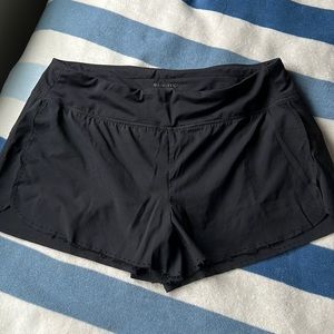 Black Athleta running shorts